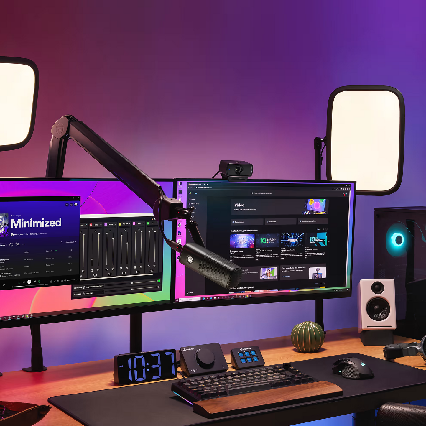 Modern home office setup with dual monitors, desk setup, and lighting equipment.