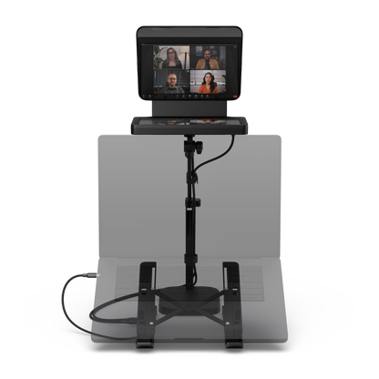 A black video conference tablet on a stand with an attached microphone and base, shown against a solid white background.