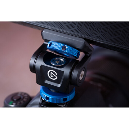 Close-up of a camera stabilizer with a blue accent on a blurred background