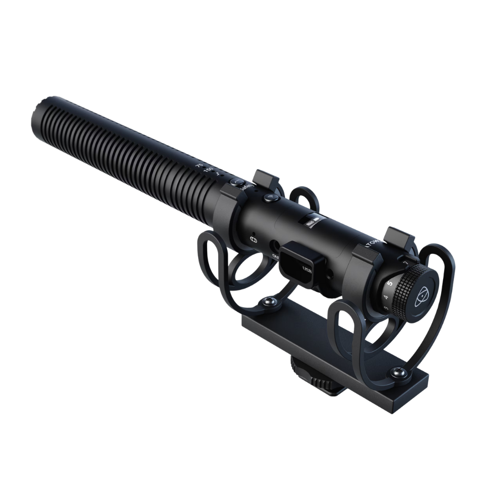 Black microphone with stand on a white background