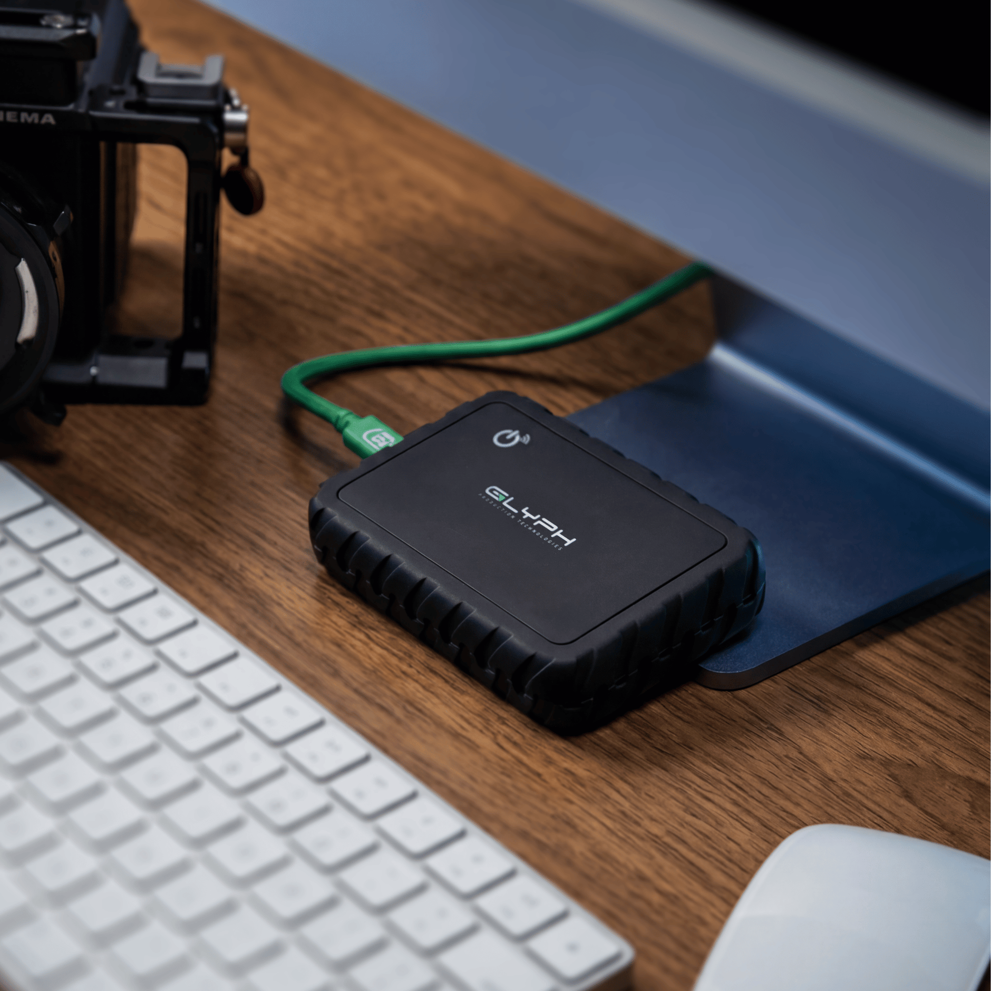 Atom EX80 High-Intensity USB4 80Gbps Portable SSD w/ Location Track on Desk