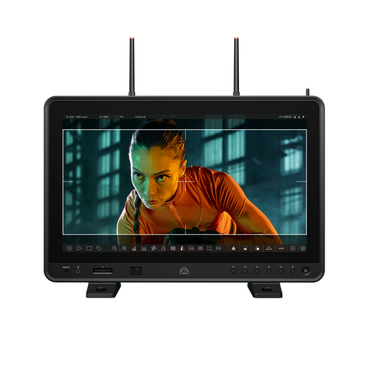 Monitor displaying a person in an orange shirt with a serious expression, on a white background