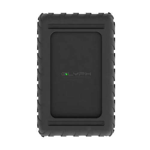 A black rugged external hard drive enclosure with a textured rubber bumper and a recessed center panel featuring the 'GLYPH' logo, shown on a plain white background.