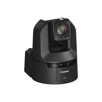 Canon 4K PTZ security camera in matte black, featuring a large lens on a swivel mount with visible power and zoom buttons on the front base, isolated on a white background.