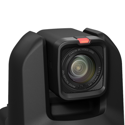Close-up of a black camera or monitor with a square lens labeled 'CARTON 4K VIDEO LENS' and '24X OPTICAL ZOOM', shown on a clean white background.