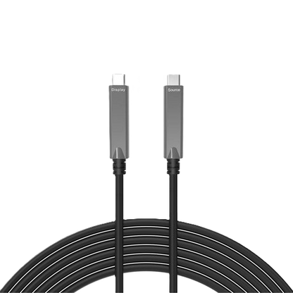 A coiled black USB-C to USB-C cable with metallic gray connector housings, shown on a plain white background. The brand name 'Source' is visible on the connector ends.
