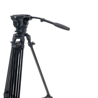 Black video camera tripod with head on a white background