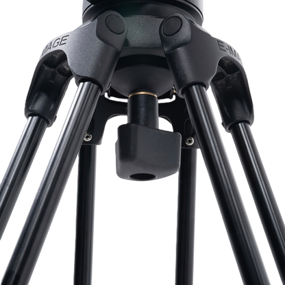 Close-up of a black tripod with brand name on a white background