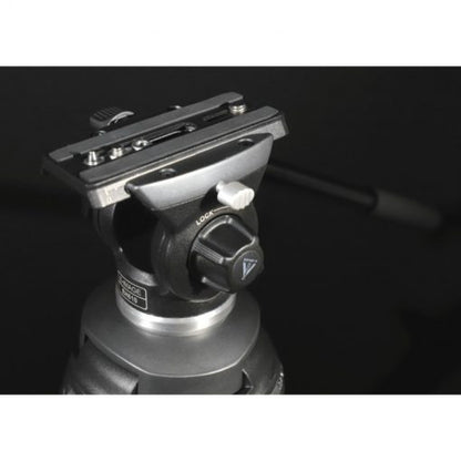 Camera tripod head with quick release plate on a black background