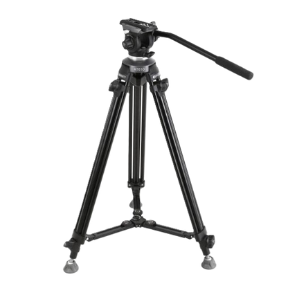 Black camera tripod with pan head on a white background