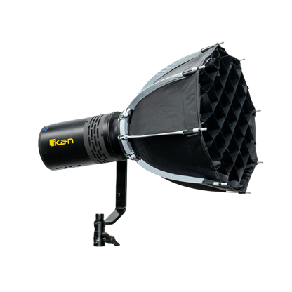 Studio light with honeycomb grid and Kast logo on a white background