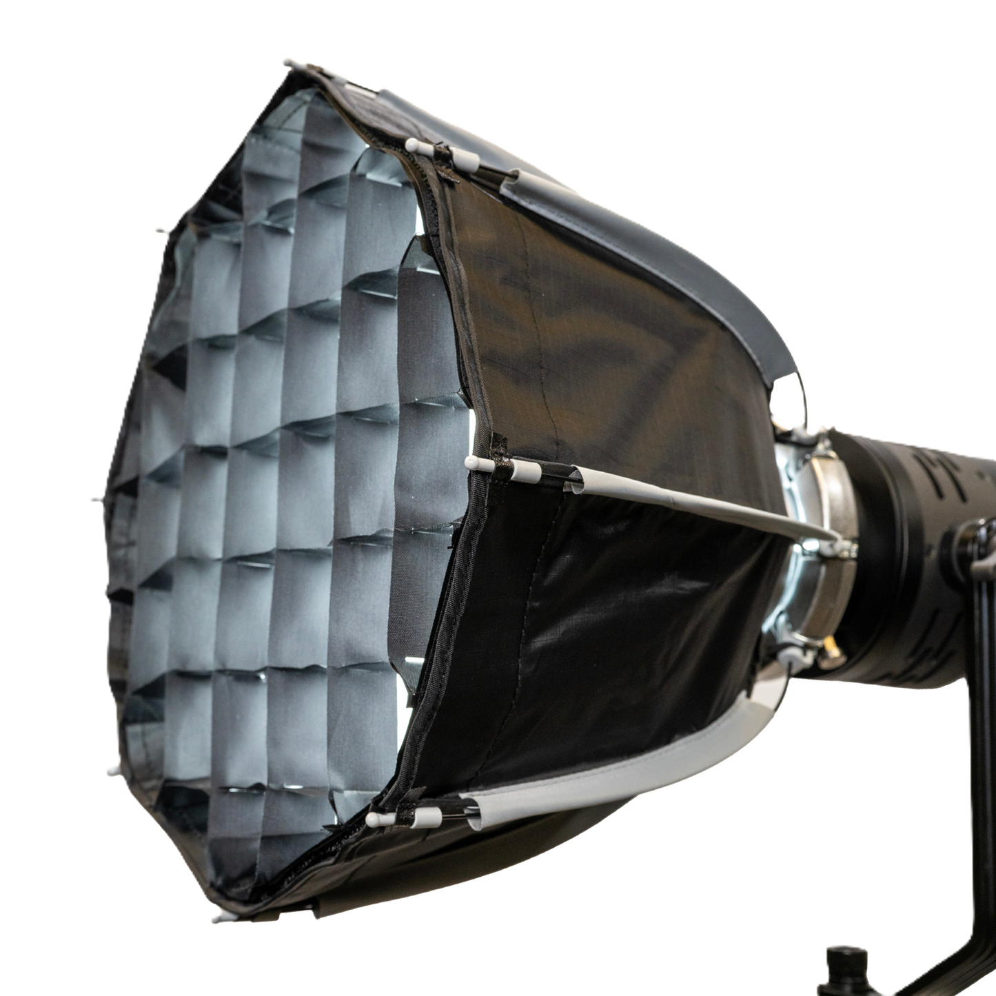 Studio light with honeycomb grid on a white background