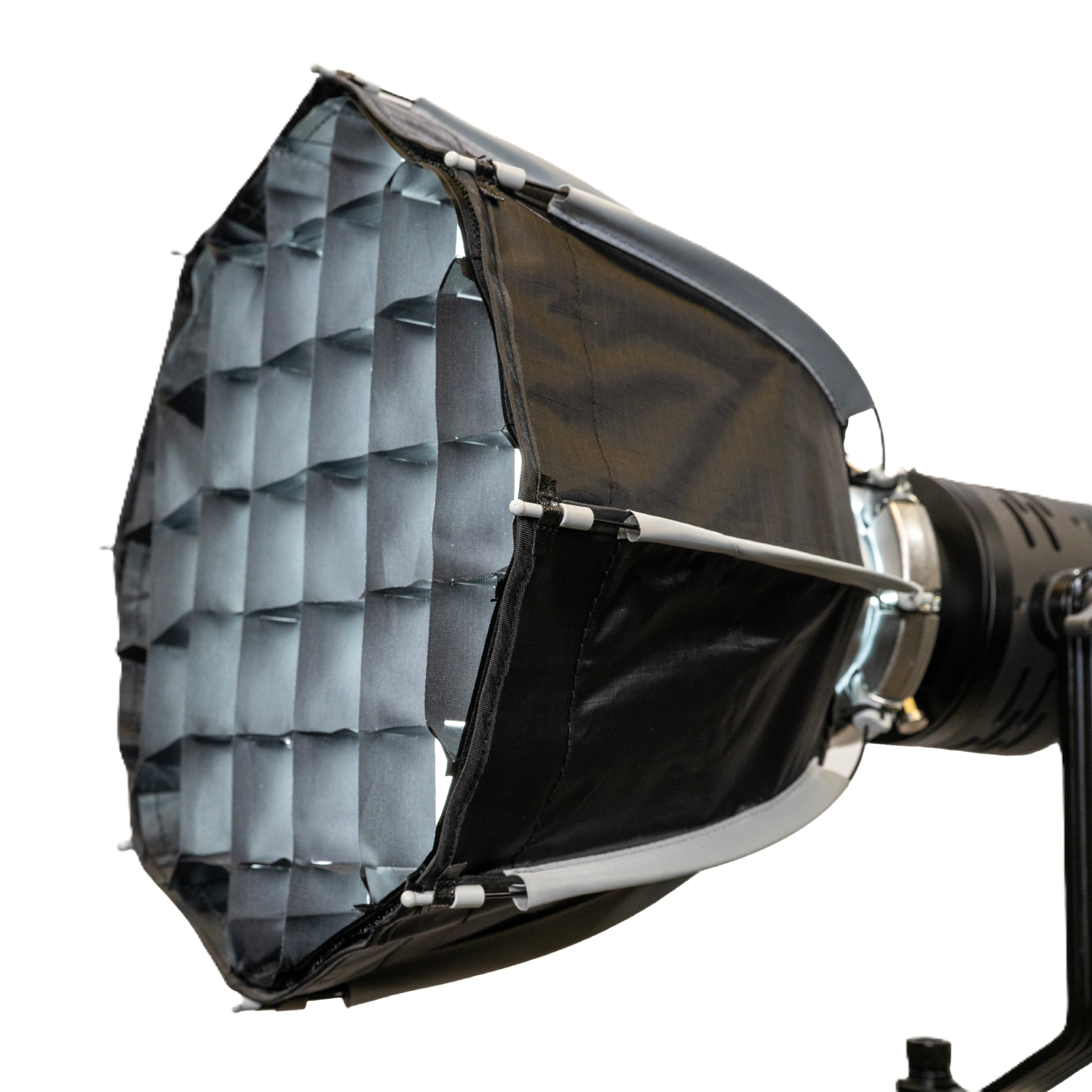 Studio light with honeycomb grid on a white background