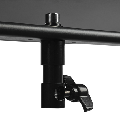 Close-up of a black metal rod with adjustable clamp on a white background