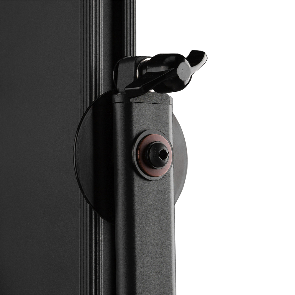 Close-up of a black camera lens with a white background