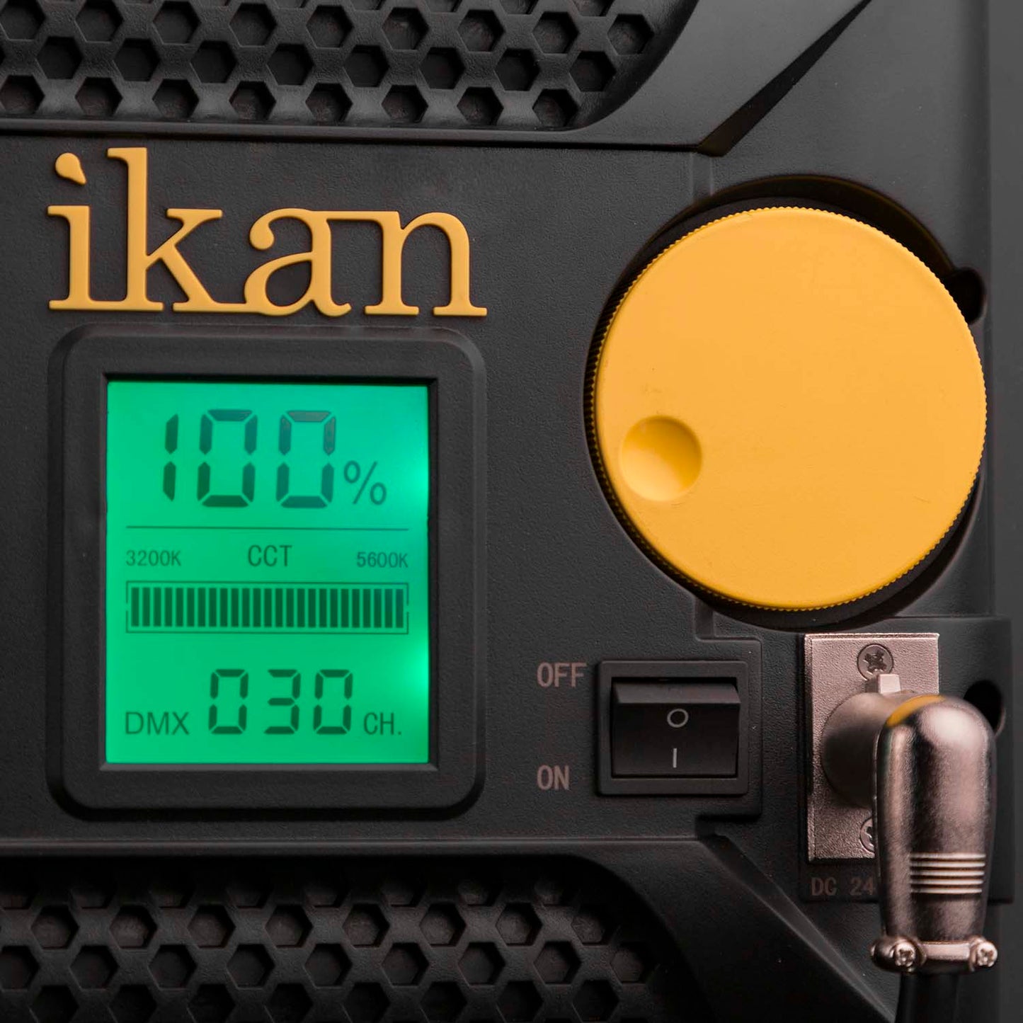 Close-up of an ikan device with digital display and control buttons.