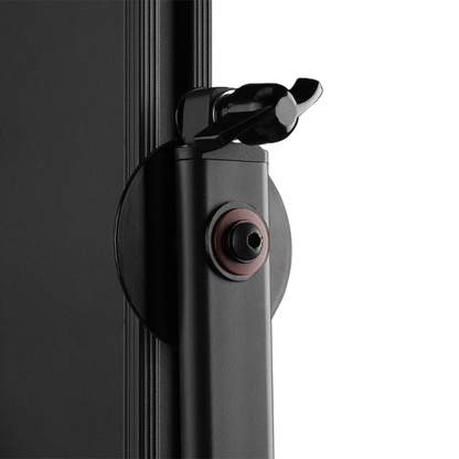 Close-up of a black mechanical component on a white background