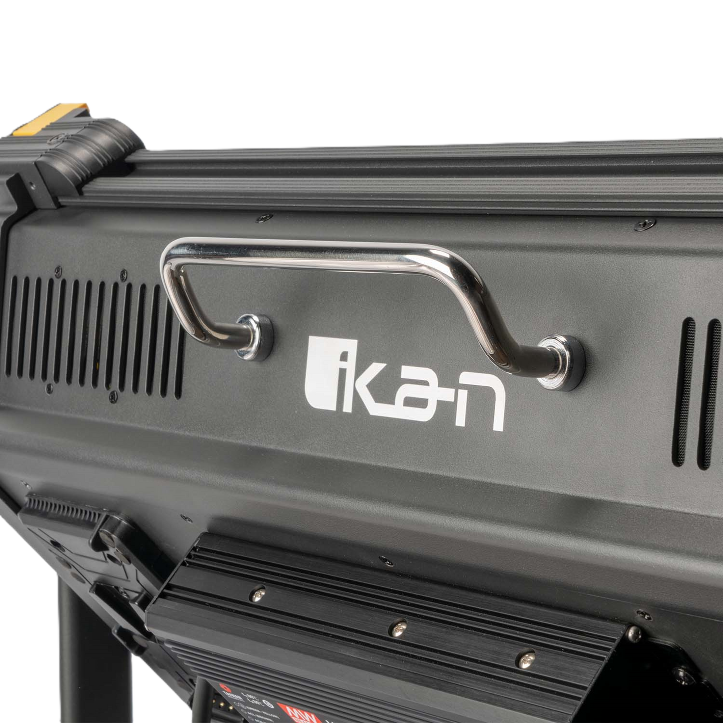 Close-up of a black light fixture with 'Ikan' branding on a white background