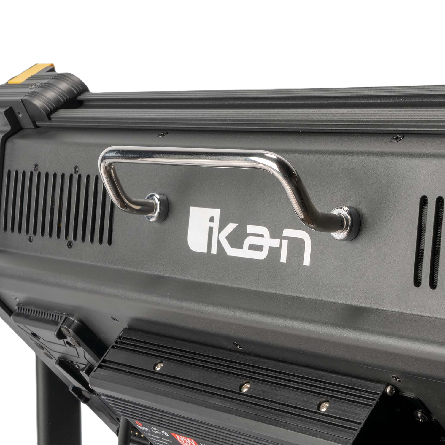 Close-up of a black light fixture with 'Ikan' branding on a white background