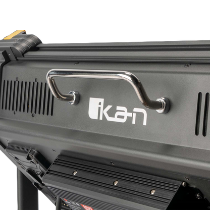 Close-up of a black light fixture with 'Ikan' branding on a white background