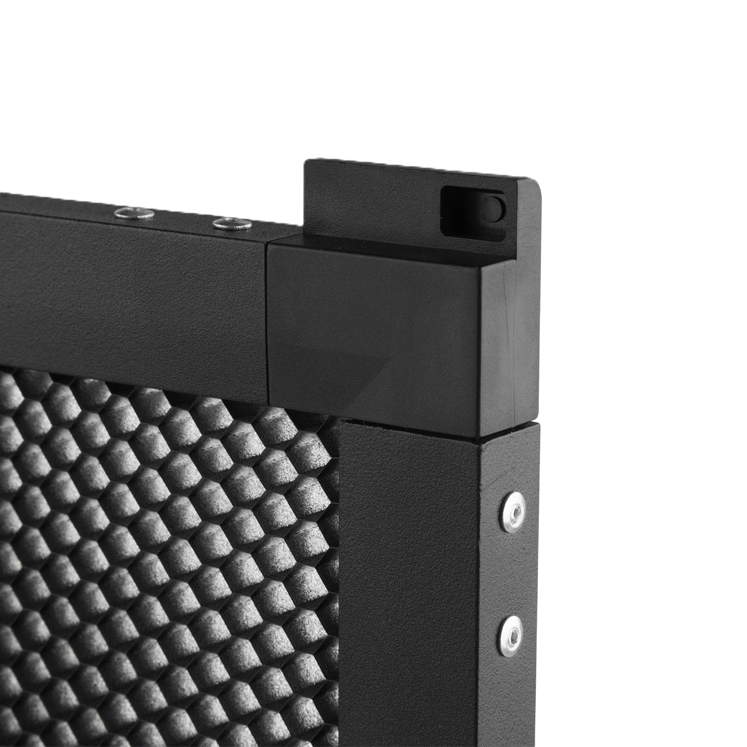 Close-up of a black metal frame with textured corner detail on a white background