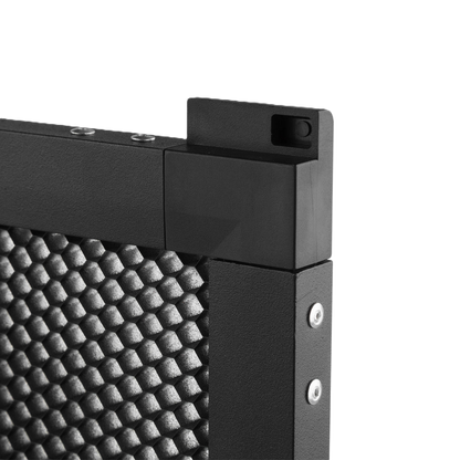 Close-up of a black metal frame with textured corner detail on a white background