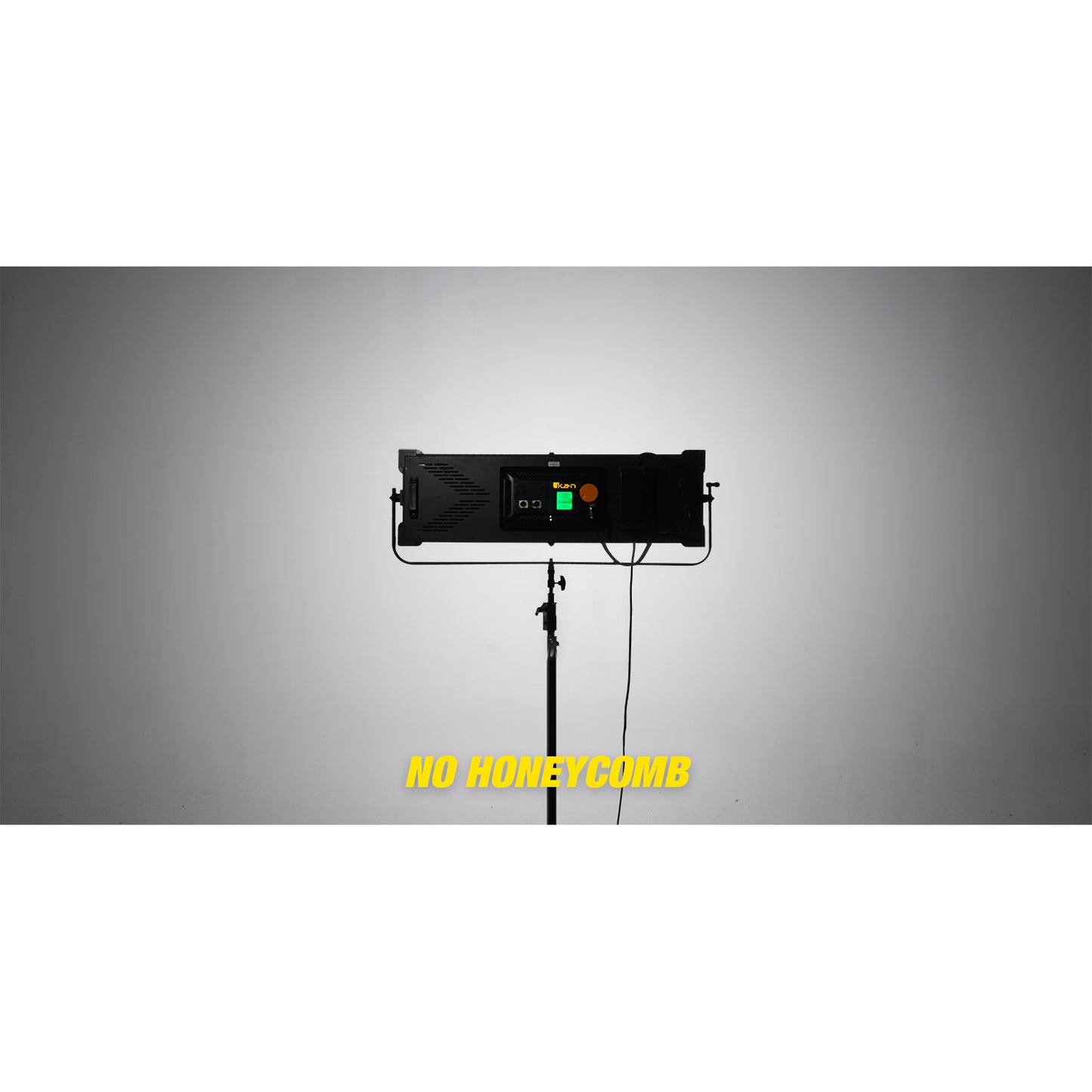 Black light fixture on a stand with 'NO HONEYCOMB' text on a gray background