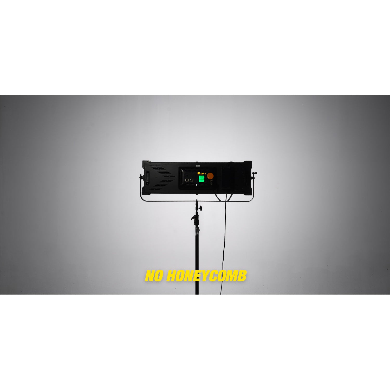 Black light fixture on a stand with 'NO HONEYCOMB' text on a gray background