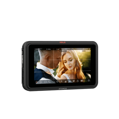 Atomos Ninja TX GO video monitor Display device with a screen showing a couple embracing, branded 'ATOMOS'.