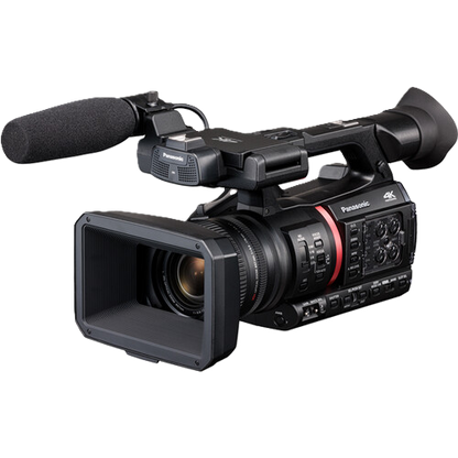Professional video camera with microphone on a white background