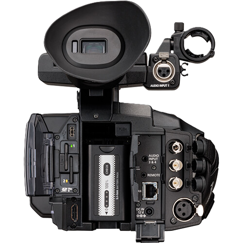 Back view of a professional video camera on a white background