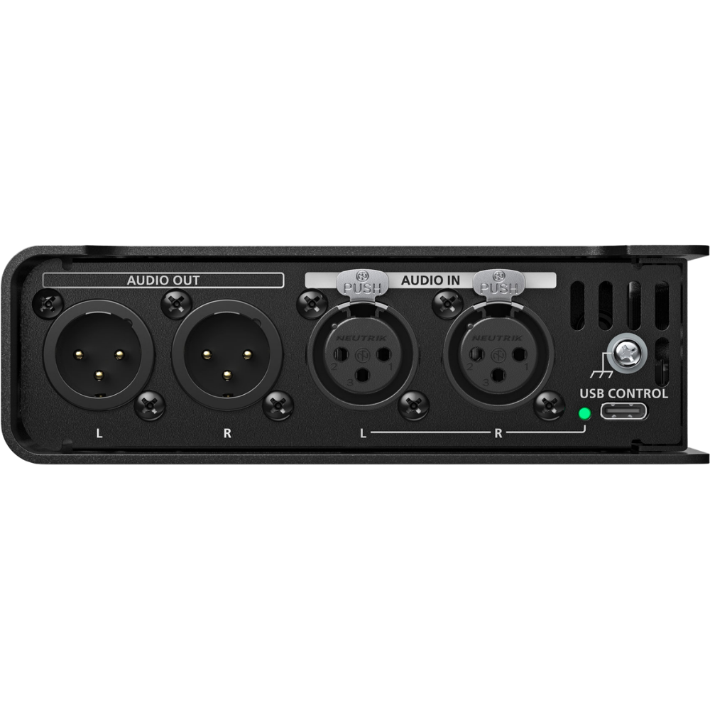 Black audio interface with multiple ports on a white background