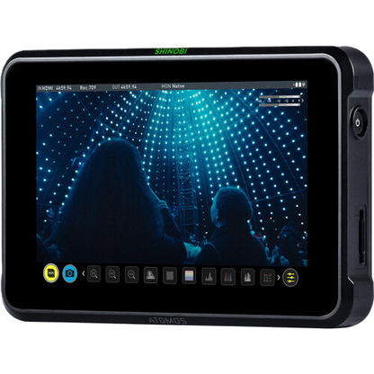 Digital display screen with video feed of a stage with lights and people, branded 'Shinobi'.