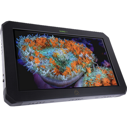 Portable monitor displaying an underwater scene with coral on a white background