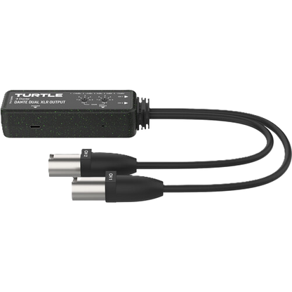 Audio adapter with XLR cables on a white background, branded 'Turtle'.