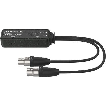 Turtle audio adapter with dual XLR inputs on a white background