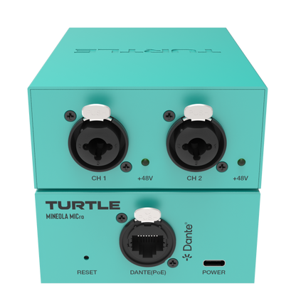 Turquoise audio interface with two XLR ports and Dante connectivity on a white background