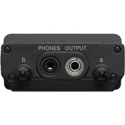 Black audio interface with phone output on a white background