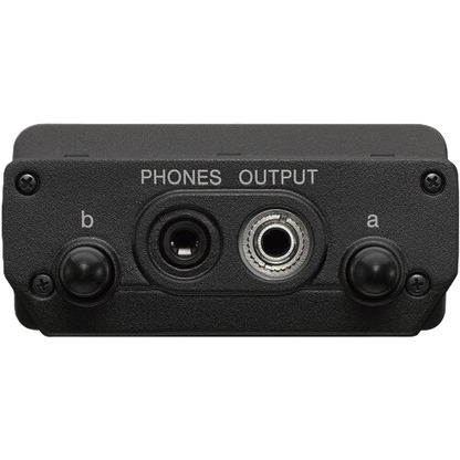 Black audio interface with phone output on a white background