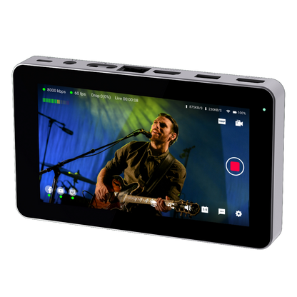 YoloBox Mini Portable device displaying a live stream of a person playing guitar on stage.